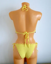 Handmade Crocheted Bikini Set on a mannequin