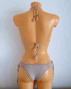 Kiwano Crochet Bikini Set With Tassels and Beads on a mannequin