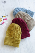 hand knitted warm womens beanies in mustard beige and blue