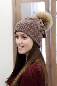 handmade merino wool hat with fur pom pom
